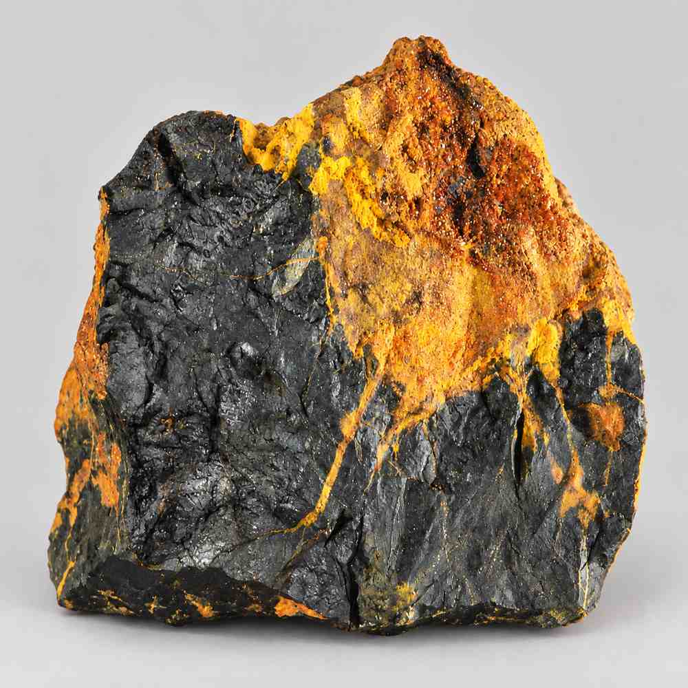 Uraninite specimen showing yellow uranium compund