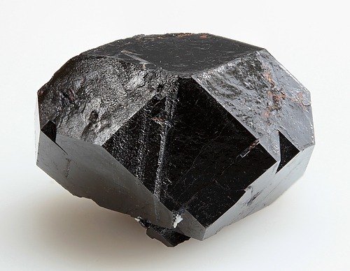 Swamp Quarry #1 uraninite group crystal with sharp faces and jet black color