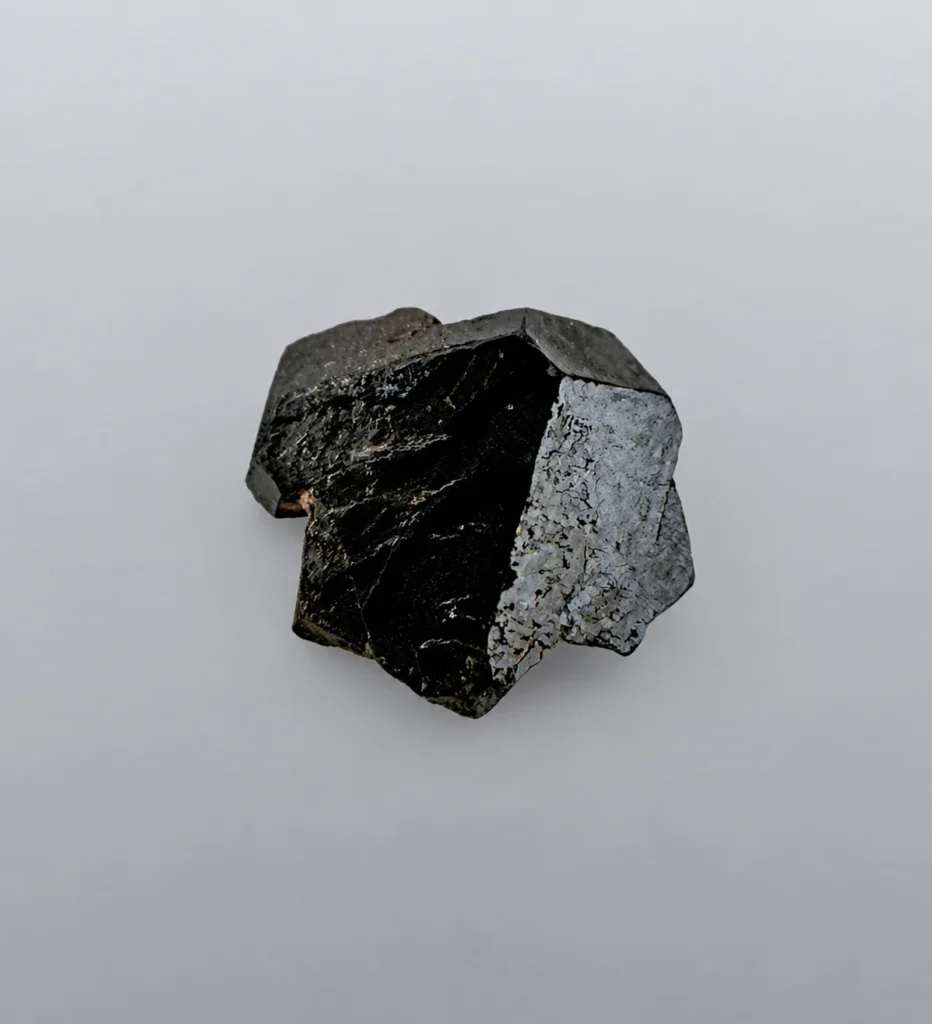 Swamp Mine crystal with sharp edges and jet black color